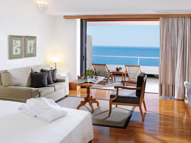Porto Elounda Golf and SPA Resort - Seafront Bungalows Living Room & Bedroom