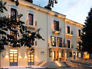 Helmos Hotel - Exterior View at Night